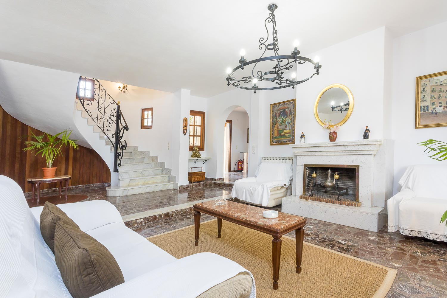 interior living room with fireplace in a rental house of Ibiza
